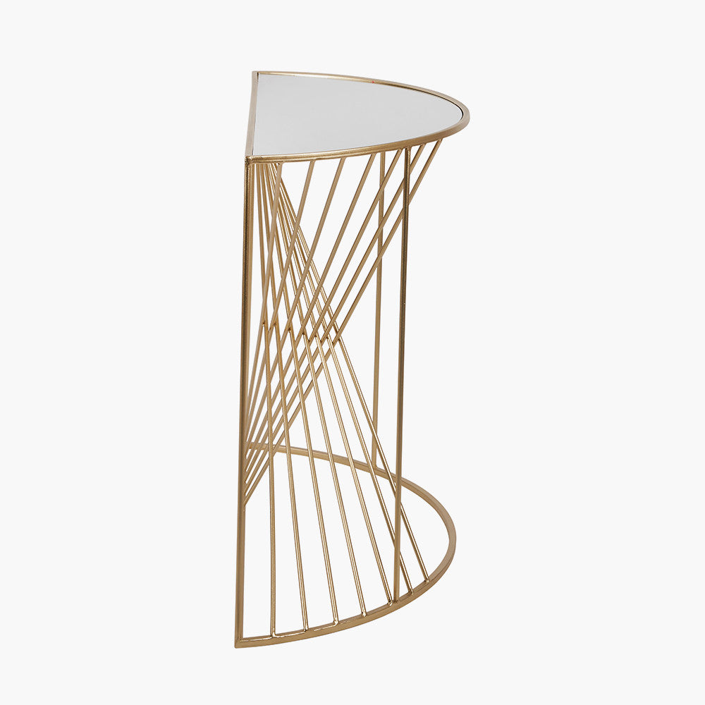 An Elegant Half Moon shape, perfect for hallways, entryways, or living rooms. Gold Metal Frame with Twisted Detailing with tempered glass top. Available at www.nobleandnook.co.uk