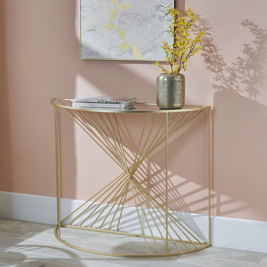 An Elegant Half Moon shape, perfect for hallways, entryways, or living rooms. Gold Metal Frame with Twisted Detailing with tempered glass top. Available at www.nobleandnook.co.uk