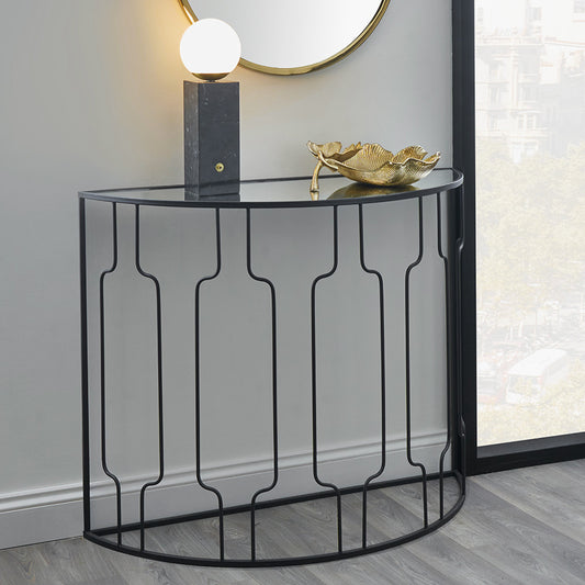 The Caprisse Console Table with its art deco-inspired design and refined half-moon silhouette makes it a standout feature in any room. Whether used in an entryway or behind a sofa. W100 x D40.5 x H81 cm. Shop online today at www.nobleandnook.co.uk