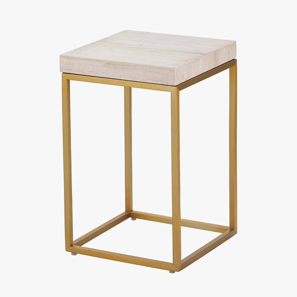 Shop the Madison side table, a contemporary design with warm burnished gold legs and a beige granite top. A luxurious addition to your home decor. Shop online today at www.nobleandnook.co.uk