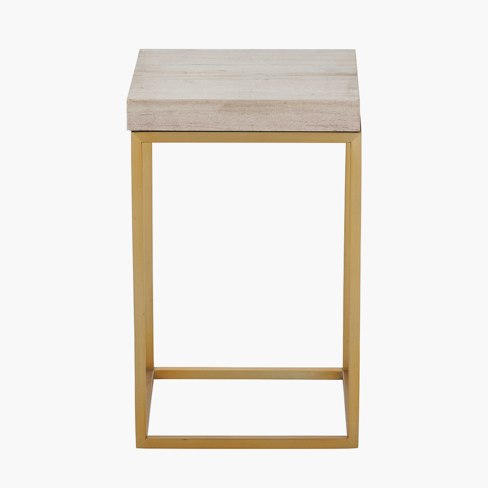 Shop the Madison side table, a contemporary design with warm burnished gold legs and a beige granite top. A luxurious addition to your home decor. Shop online today at www.nobleandnook.co.uk