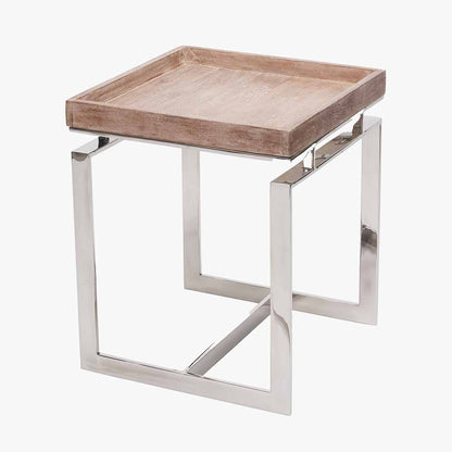 Shop the Evelyn Side Table, featuring a hand-finished antique mango wood top and a polished stainless steel frame. Dimensions W46xD46xH55cm. Shop online today at www.nobleandnook.co.uk