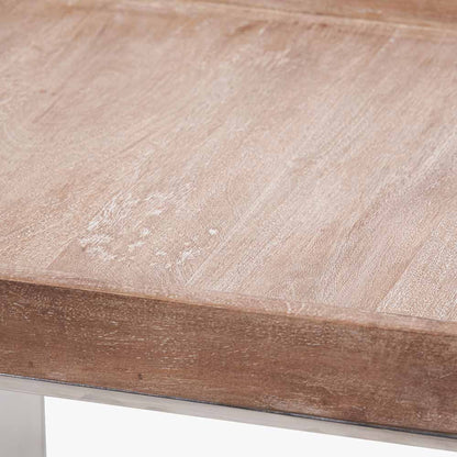 Shop the Evelyn Side Table, featuring a hand-finished antique mango wood top and a polished stainless steel frame. Dimensions W46xD46xH55cm. Shop online today at www.nobleandnook.co.uk