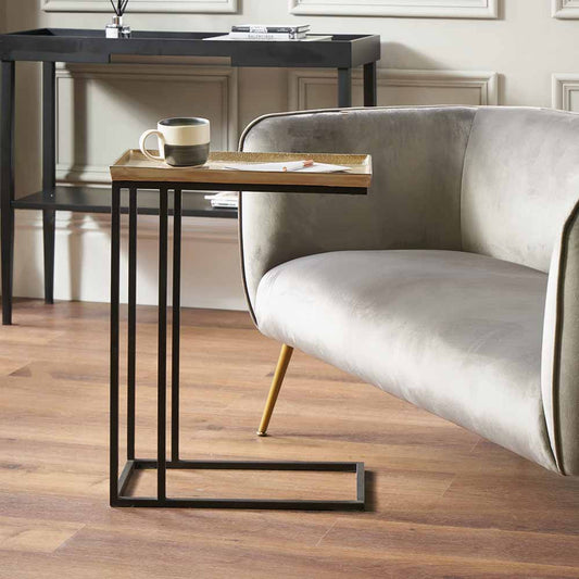 Bring a touch of boutique-style glamour to your home with the Franklin Gold Cast and Black Metal Supper Side Table. No Assembly Required. Meticulously handcrafted in India.