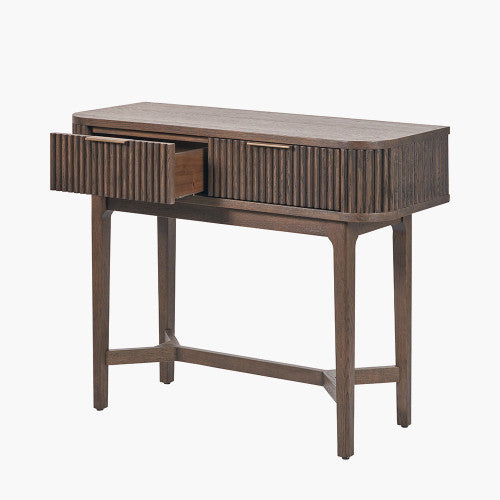 Shop the Raie Console Table with Ribbed Wood Detailing with two spacious drawers. High-quality construction. Dimensions W100xD38xH80cm. Shop online to day at www.nobleandnook.co.uk