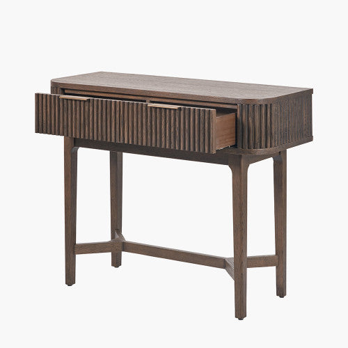 Shop the Raie Console Table with Ribbed Wood Detailing with two spacious drawers. High-quality construction. Dimensions W100xD38xH80cm. Shop online to day at www.nobleandnook.co.uk