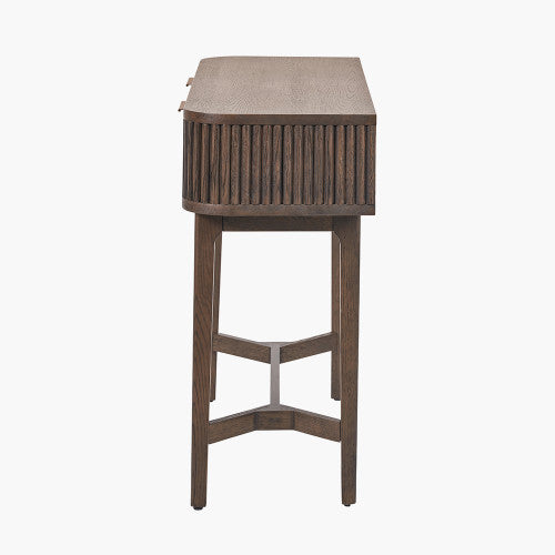 Shop the Raie Console Table with Ribbed Wood Detailing with two spacious drawers. High-quality construction. Dimensions W100xD38xH80cm. Shop online to day at www.nobleandnook.co.uk