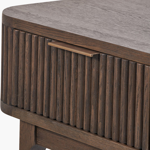 Shop the Raie Console Table with Ribbed Wood Detailing with two spacious drawers. High-quality construction. Dimensions W100xD38xH80cm. Shop online to day at www.nobleandnook.co.uk