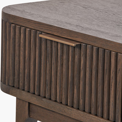Shop the Raie Console Table with Ribbed Wood Detailing with two spacious drawers. High-quality construction. Dimensions W100xD38xH80cm. Shop online to day at www.nobleandnook.co.uk