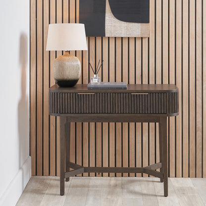 Shop the Raie Console Table with Ribbed Wood Detailing with two spacious drawers. High-quality construction. Dimensions W100xD38xH80cm. Shop online to day at www.nobleandnook.co.uk