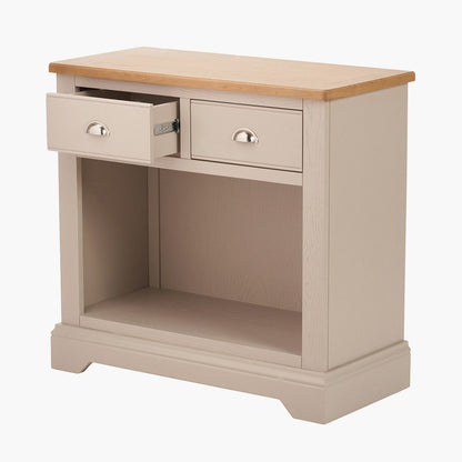 Add timeless country cottage charm to your home with the Fairford 2-Drawer Console Table. Crafted from pine wood with a parchment-white finish and oak-effect top, this elegant table offers practical storage and arrives fully assembled.