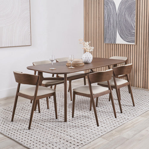 Shop the Elias Dining Table and 6 matching Chairs, blending minimalist elegance with Scandinavian-inspired design. Expertly crafted from solid ash wood with a stylish on-trend dark finish. Shop online today at www.nobleandnook.co.uk