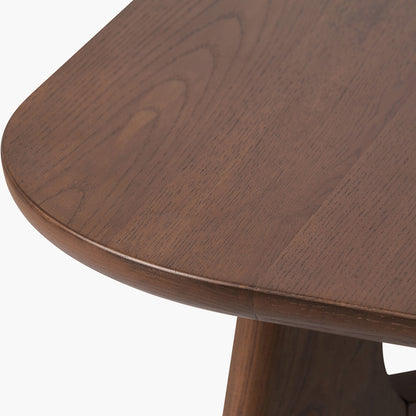 Shop the Elias Dining Table, blending minimalist elegance with Scandinavian-inspired design. Expertly crafted from solid ash wood with a stylish on-trend dark finish. Shop online today at www.nobleandnook.co.uk