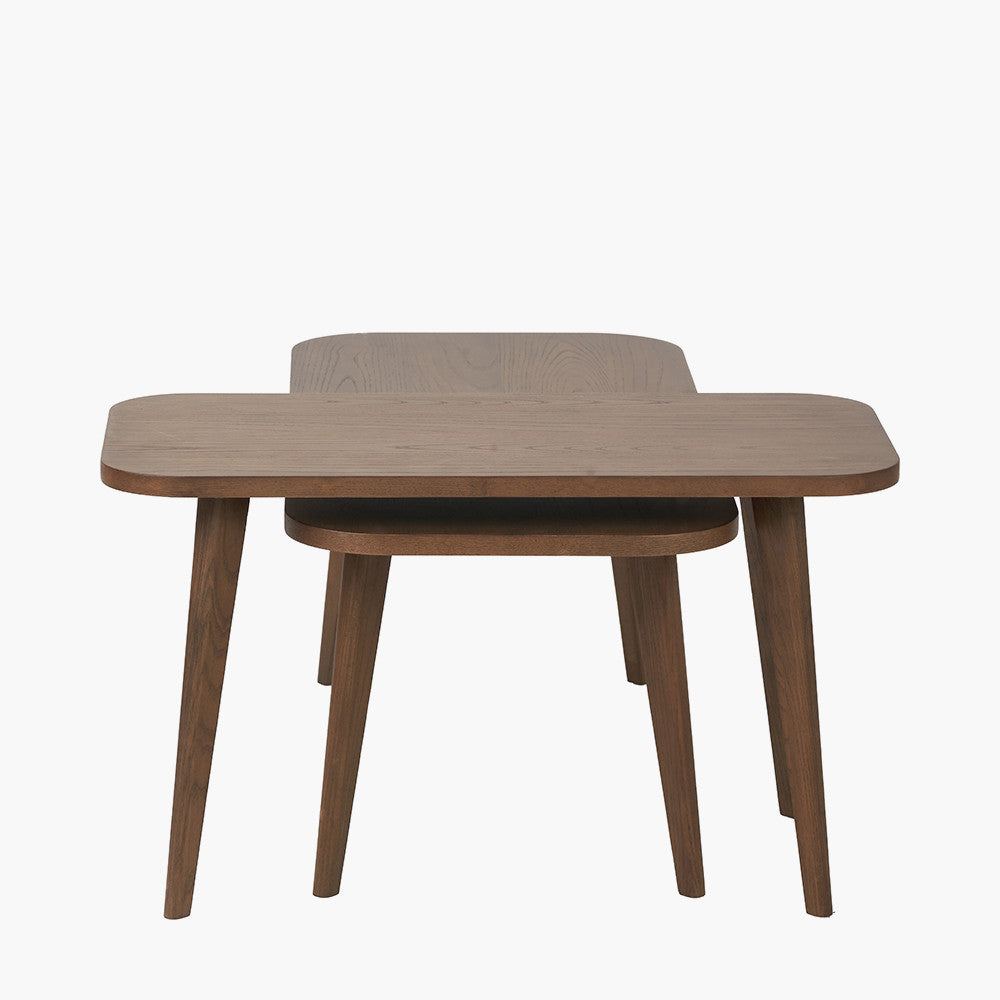 Close up of dark ash wood grain on nesting coffee tables