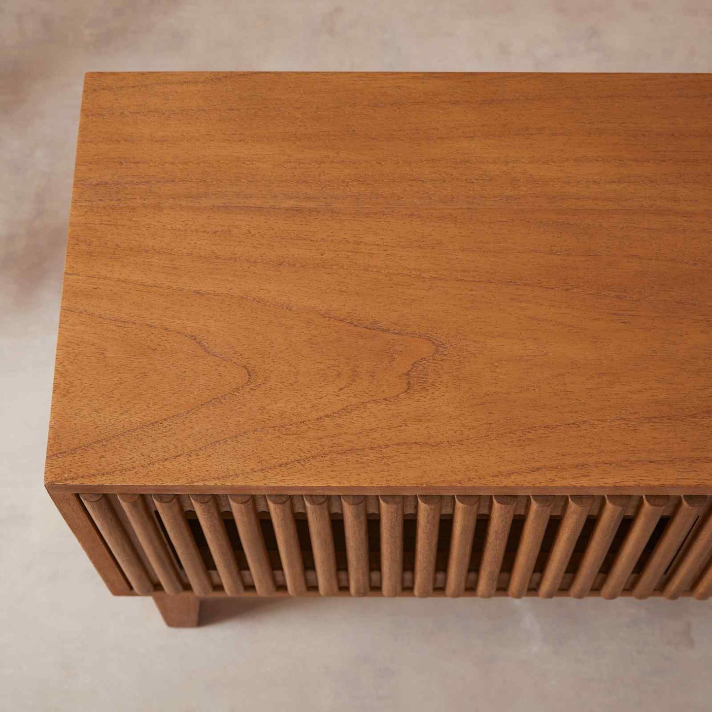 Wooden radiator on a beige background