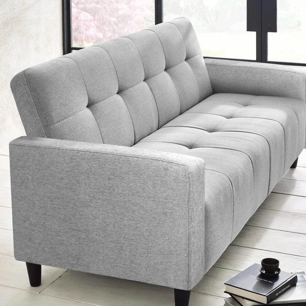 The Alfie 3 Seater Grey Linen Sofa Bed with storage offers both versatility and comfort. Ideal if you need a stylish seating option or an instant sleep solution for guests. Shop online today at www.nobleandnook.co.uk