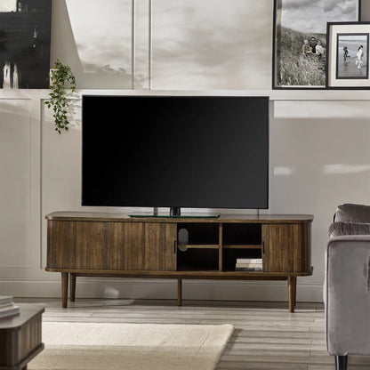 Elevate your living room with the Arya TV Media Unit in refined dark oak effect finish with sliding slatted doors. Perfect for modern homes. Shop online today at www.nobleandnook.co.uk