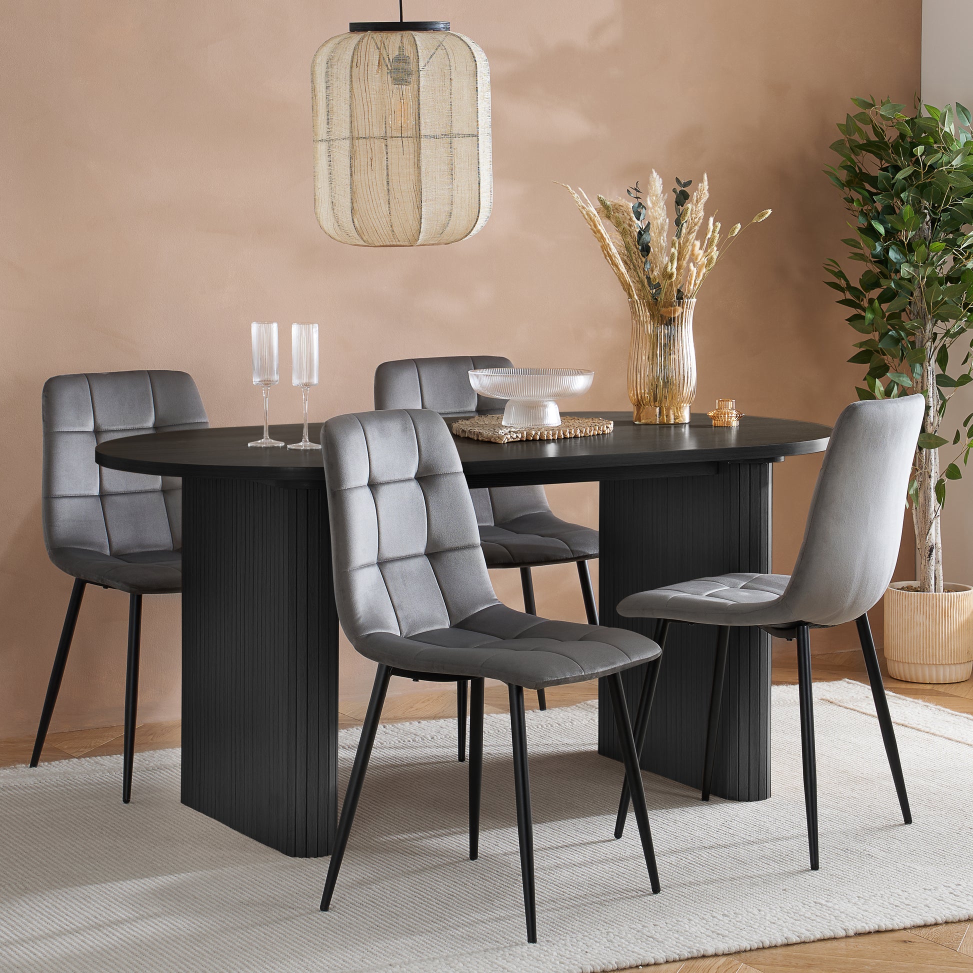 Crafted from premium MDF and available in two stylish finishes, oak or black, this oval table features beautiful fluted detailing that creates a modern, refined look. Shop online today at www.nobleandnook.co.uk
