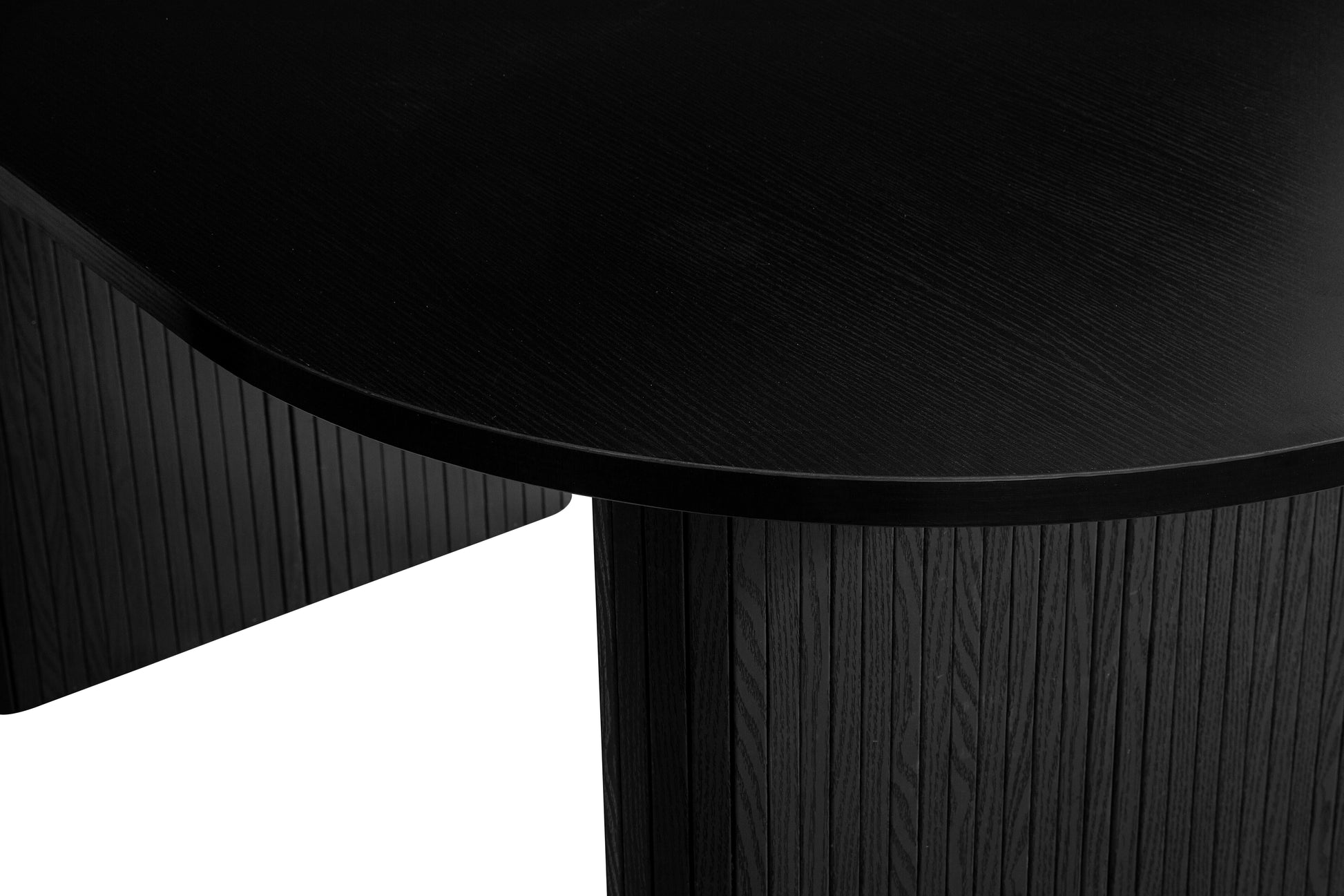 Crafted from premium MDF and available in two stylish finishes, oak or black, this oval table features beautiful fluted detailing that creates a modern, refined look. Shop online today at www.nobleandnook.co.uk