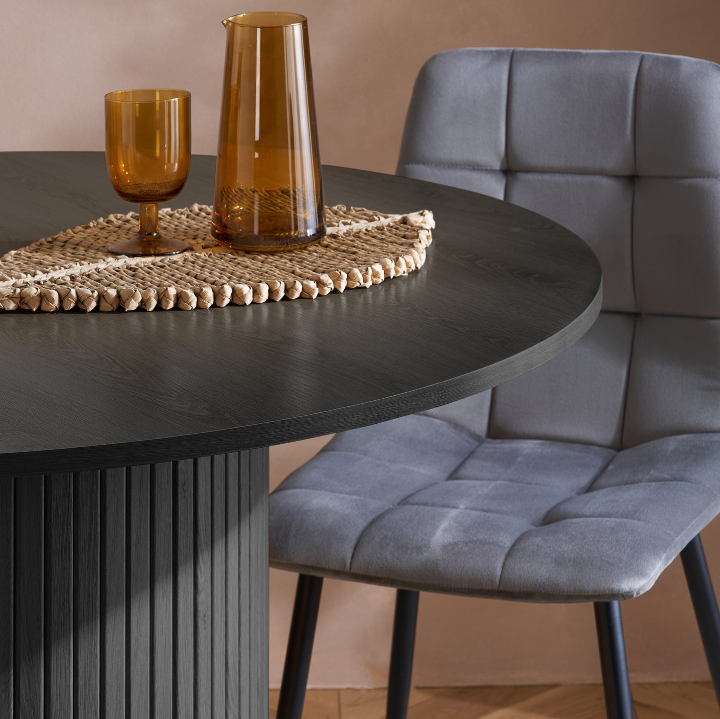 Contemporary round dining table with elegant fluted detailing, this piece adds subtle texture and modern charm to your dining space (dimensions H76xW120xD120cm) Shop online today at www.nobleandnook.co.uk