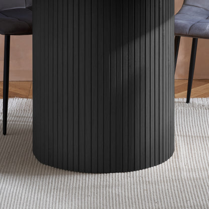 Contemporary round dining table with elegant fluted detailing, this piece adds subtle texture and modern charm to your dining space (dimensions H76xW120xD120cm) Shop online today at www.nobleandnook.co.uk