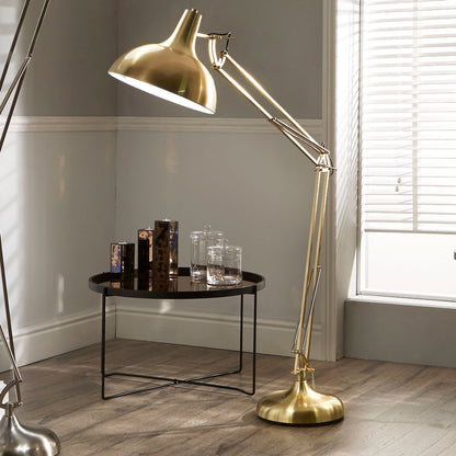 The Alonzo Brass Metal Task Floor Lamp - a sleek and contemporary design of the industrial task lamp offering an enhancement to any room. Shop online now at www.nobleandnook.co.uk
