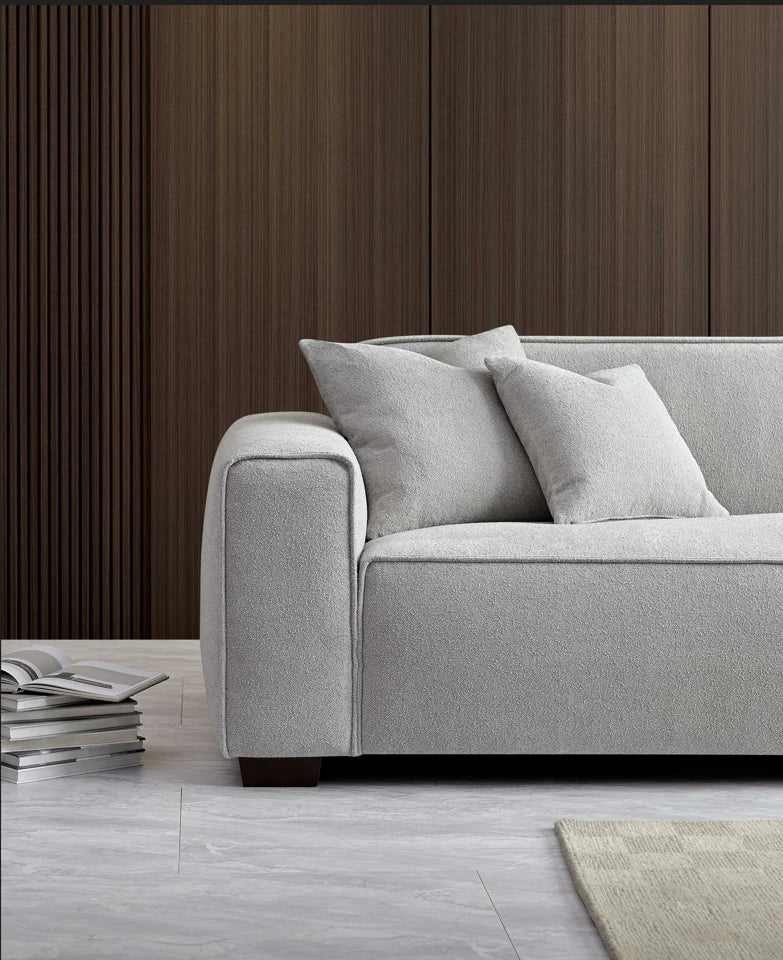 Shop the Aluxo Dakota, an exquisitely designed sofa providing unparalleled comfort and luxury with generous padding of duck feathers along the arms, seats, and back, it boasts a boxed silhouette and elegant piping detail, expertly combining modern luxury with timeless opulence. Shop online today at www.nobleandnook.co.uk  SKU 10-T-SF003-DKT-G302-3A-CR