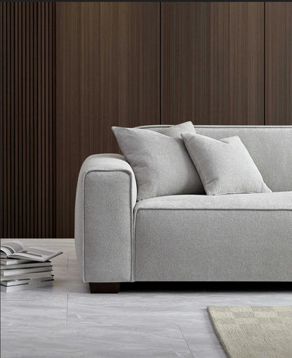 Shop the Aluxo Dakota, an exquisitely designed sofa providing unparalleled comfort and luxury with generous padding of duck feathers along the arms, seats, and back, it boasts a boxed silhouette and elegant piping detail, expertly combining modern luxury with timeless opulence. Shop online today at www.nobleandnook.co.uk  SKU 10-T-SF003-DKT-G302-3A-CR