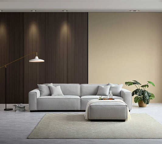 Shop the Aluxo Dakota, an exquisitely designed sofa providing unparalleled comfort and luxury with generous padding of duck feathers along the arms, seats, and back, it boasts a boxed silhouette and elegant piping detail, expertly combining modern luxury with timeless opulence. Shop online today at www.nobleandnook.co.uk  SKU 10-T-SF003-DKT-G302-3A-CR