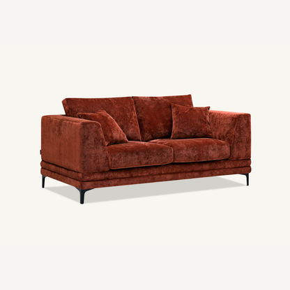 Shop the Aluxo Lenox 2 and 3 Seater Sofas in Rust Velvet, timeless mid-century modern sofas with deep sumptuous cushions for you to sink into and relax. Crafted with a solid wooden frame and high-density foam padding. Shop online today at www.nobleandnook.co.uk