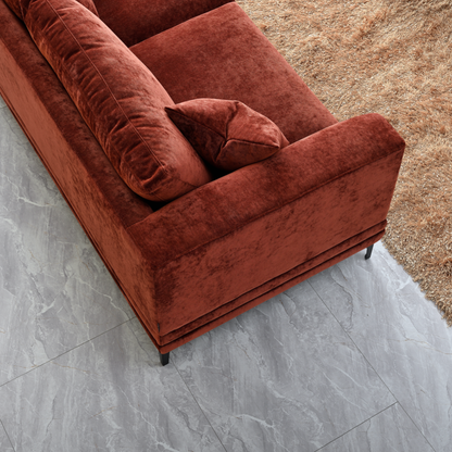 Shop the Aluxo Lenox 3 Seater Sofa in Rust Velvet, a timeless mid-century modern sofa that combines sleek lines and minimalist design with deep, sumptuous cushions for the utmost comfort. Crafted with a solid wooden frame and high-density foam padding. Shop online today at www.nobleandnook.co.uk