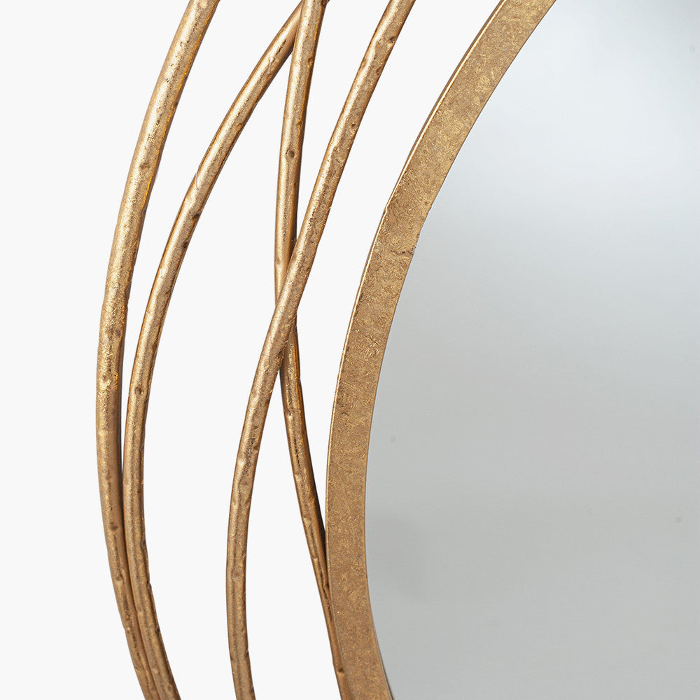 Bring a refined touch to your home with the Antique Gold Metal Swirl Round Wall Mirror. Perfect for your living room, hallway, or bedroom. Shop online now at www.nobleandnook.co.uk