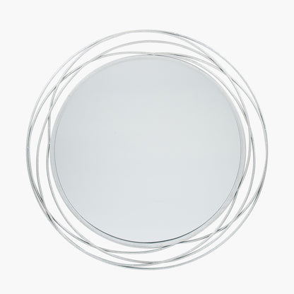 Featuring delicate swirling metalwork finished in a stunning antique silver, this mirror brings light, depth, and elegance to your space. Shop online now at www.nobleandnook.co.uk