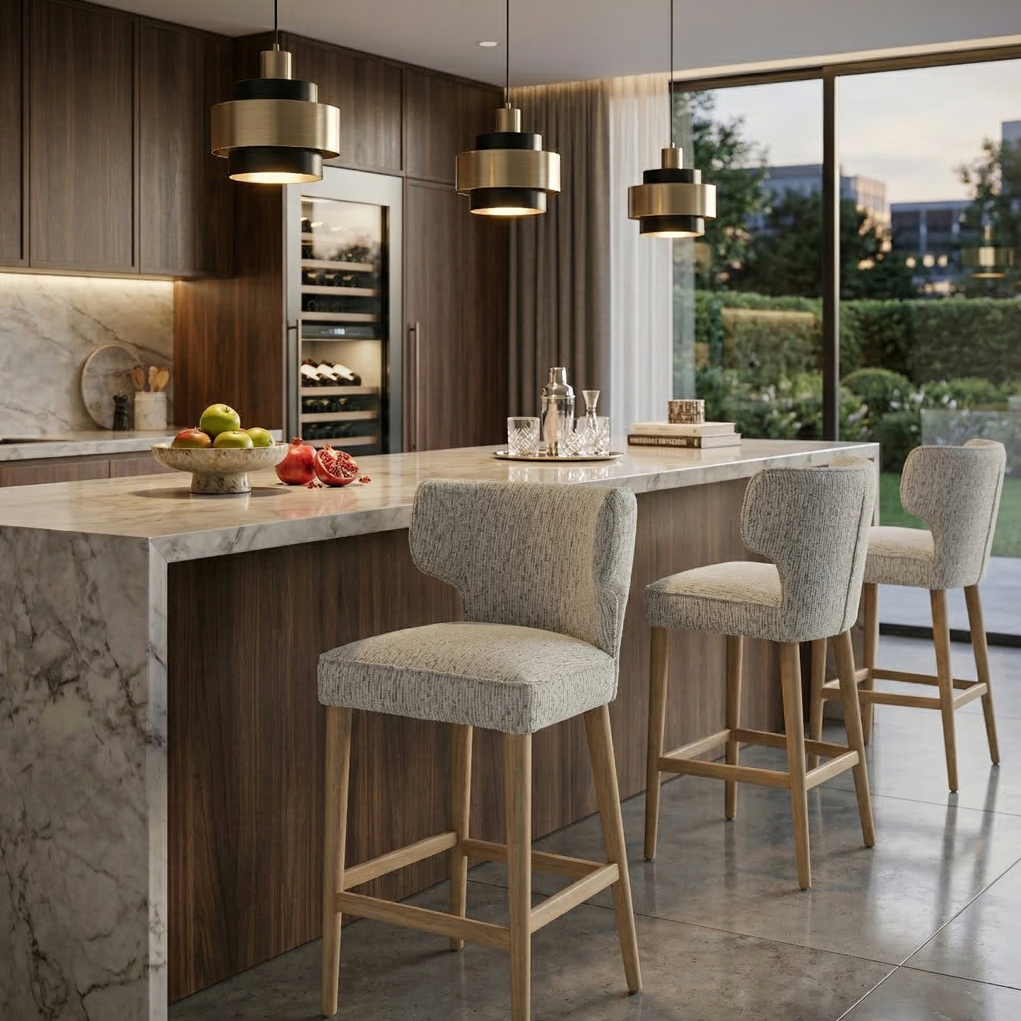 Modern kitchen with marble island and bar stools, featuring a large window view.