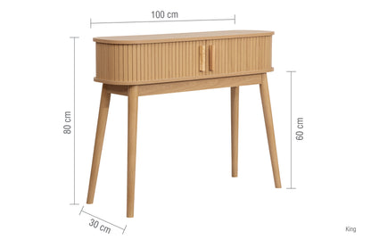 Elevate your interior with the Axel Console Table in an Oak Finish. This stylish table features exquisite fluted detailing, adds depth and sophistication to any living space. Shop online today at www.nobleandnook.co.uk