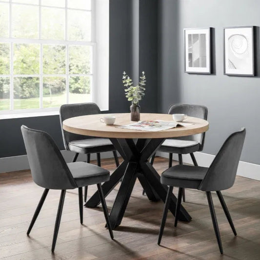 Perfect for everyday use, blending practicality with visual impact, with Dimensions of H75xL120xW120cm. Bring a touch of modern industrial charm to your dining area with the Berwick Round Dining Table. Shop today at www.nobleandnook.co.uk