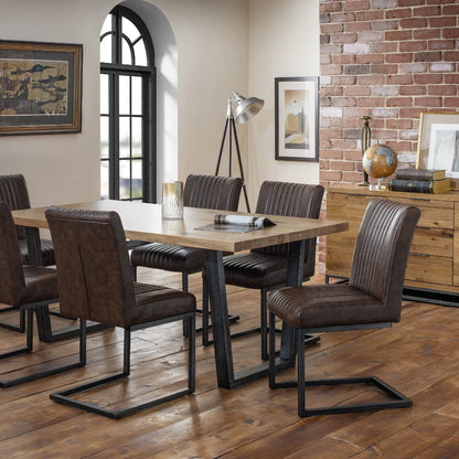 Set of 2 Industrial Dining Chairs - Vintage Brown Faux Leather Upholstery - No Assembly Required – 12-Month Product Guarantee - H88.5 x W47 x D65 cm. www.nobleandnook.co.uk