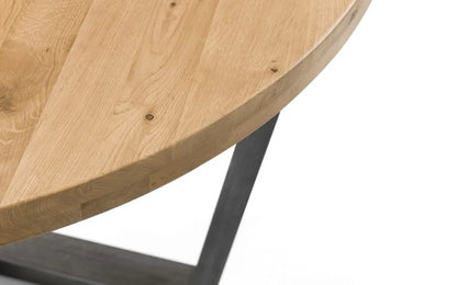 Bring industrial charm and rustic warmth to your dining space with the Brooklyn Round Dining Table finished from solid oak and designed to seat four people. Dimensions: H76xL120xW120cm. Shop online today at www.nobleandnook.co.uk