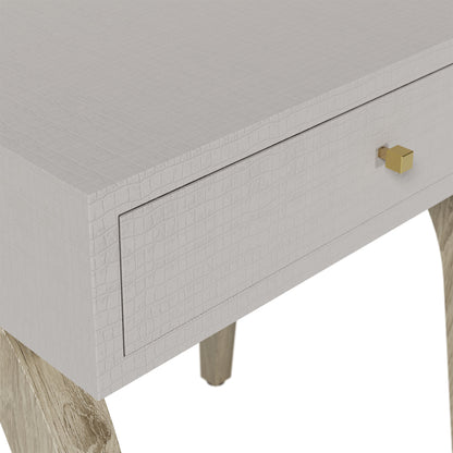 Shop the Laverstoke Bedside Table in rustic crocodile-style concrete finish and natural curved oak legs exude exclusivity. Shop online now at www.nobleandnook.co.uk
