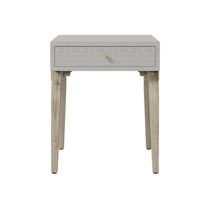 Shop the Laverstoke Bedside Table in rustic crocodile-style concrete finish and natural curved oak legs exude exclusivity. Shop online now at www.nobleandnook.co.uk