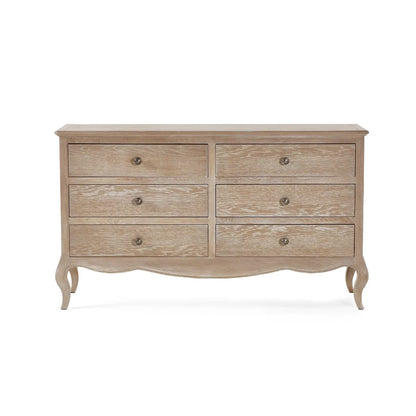 Shop the Camille 6 Drawer Oak Wide Chest, inspired by French design, it features beautiful curves, soft lines and traditional ornate details. FREE UK MAINLAND DELIVERY on orders over £100. Shop online today now at www.nobleandnook.co.uk