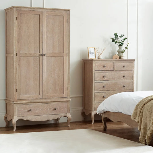 Shop the Camille Oak Limed Double Wardrobe, a timeless French-inspired design with elegant curves and intricate detailing. FREE UK MAINLAND DELIVERY. Shop online now at www.nobleandnook.co.uk