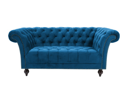 Shop the Chesterfield 2 Seater Sofa in Midnight Blue, combines a timeless charm with modern comfort, making it the perfect addition to any stylish living space. Shop online today at www.nobleandnook.co.uk