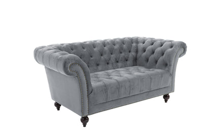 Elevate your living space with the Chesterfield 2-Seater Sofa, upholstered in velvet. Offering a blend of timeless elegance and modern comfort. Shop online today at www.nobleandnook.co.uk