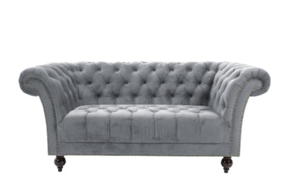 Elevate your living space with the Chesterfield 2-Seater Sofa, upholstered in velvet. Offering a blend of timeless elegance and modern comfort. Shop online today at www.nobleandnook.co.uk