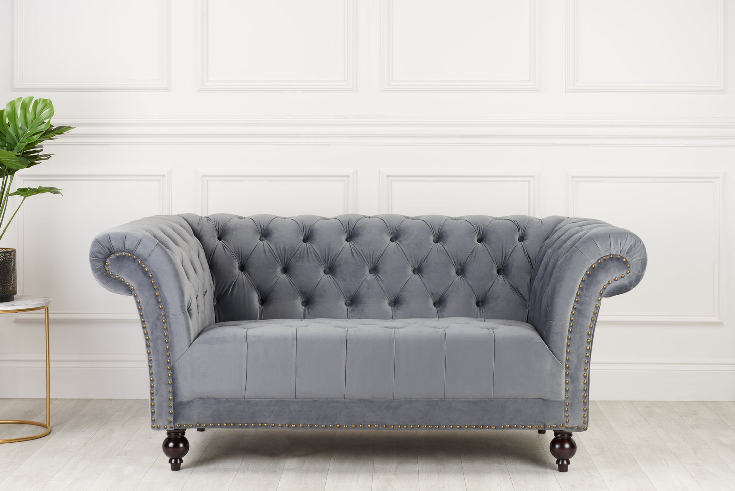 Elevate your living space with the Chesterfield 2-Seater Sofa, upholstered in velvet. Offering a blend of timeless elegance and modern comfort. Shop online today at www.nobleandnook.co.uk