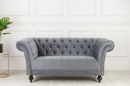 Elevate your living space with the Chesterfield 2-Seater Sofa, upholstered in velvet. Offering a blend of timeless elegance and modern comfort. Shop online today at www.nobleandnook.co.uk
