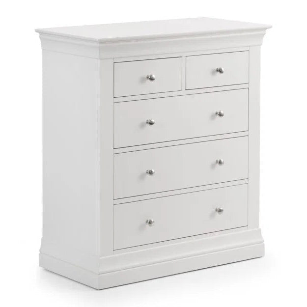 White dresser with multiple drawers on a white background