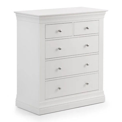 White dresser with multiple drawers on a white background