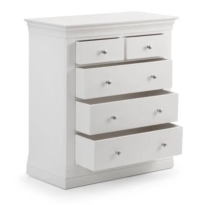 White dresser with multiple drawers on a white background